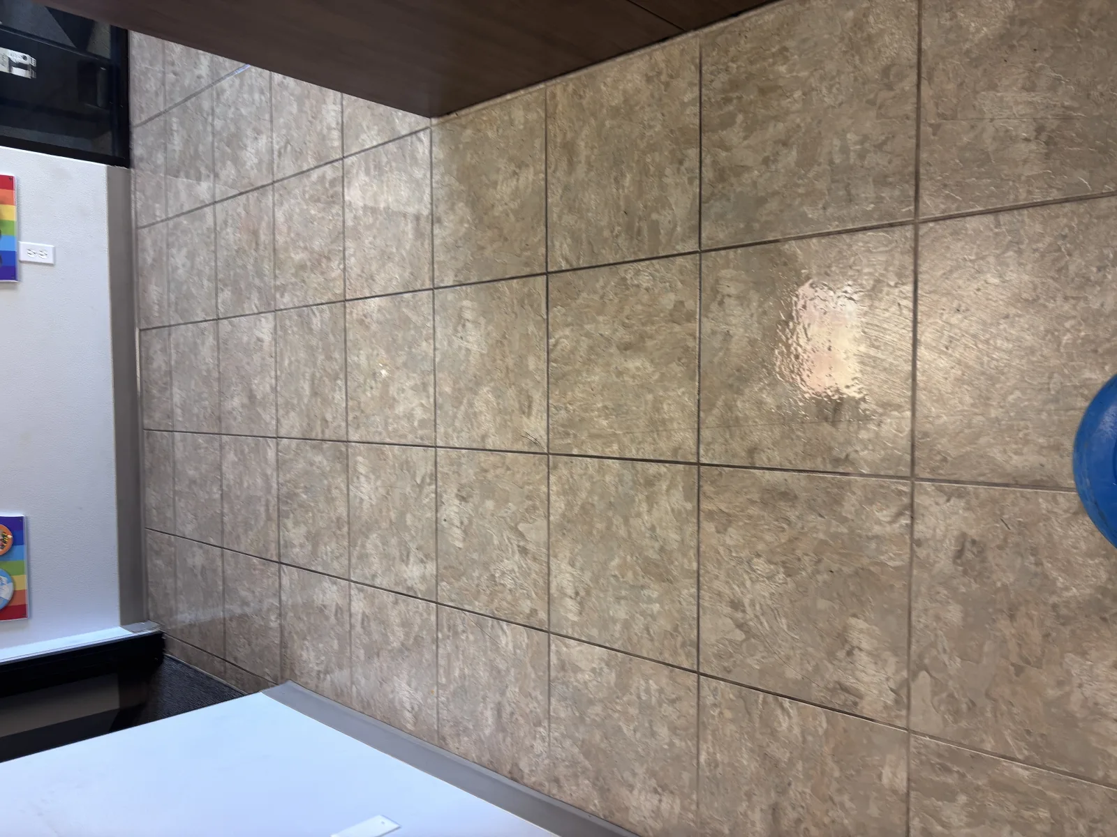 Owner-shot stone floor after professional cleaning and restoration work